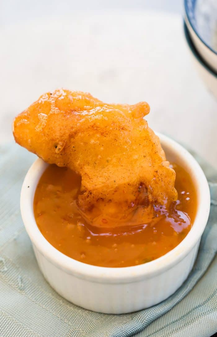 These homemade Chinese chicken fingers are JUST like from a restaurant. Crispy and golden on the outside and filled with juicy chicken on the inside. Perfect with sweet and sour sauce! Chicken Fingers