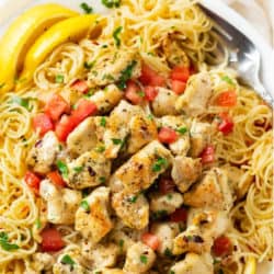 A labeled image of chicken scampi on a white platter.